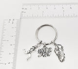 Runner themed keychain. Includes Running Figurine, Running Sneaker, and I Love to Run Charms. Athlete Runner gift.