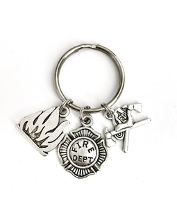Firefighter themed keychain. Includes Flame, Fire Department badge, and Helmet and Axe charms. Firefighter Gift.