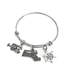 Massachusetts themed bracelet. Includes State of Massachusetts, a Lobster, and Ship Wheel Charms. Boston Lover Gift.