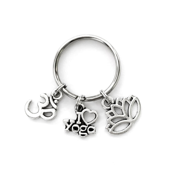 Yoga themed keychain. Includes Ohm symbol, Lotus Flower, and I Love Yoga Charms. Yoga Teacher gift.